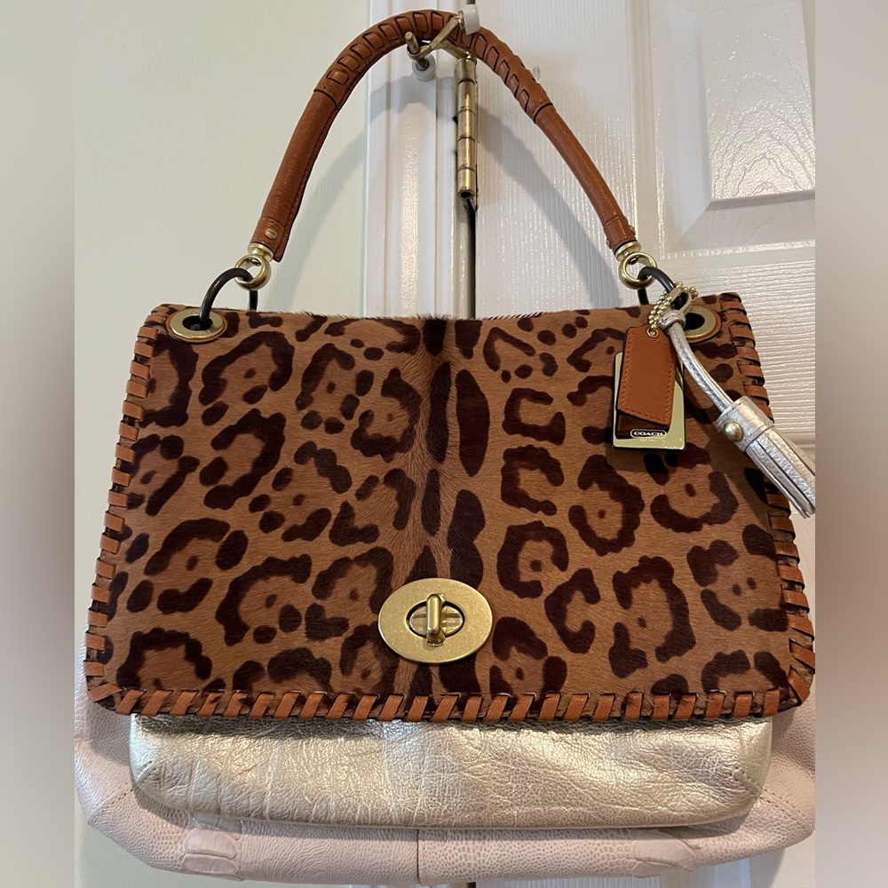 Very rare Coach Hampton’s collection Calf hair flap bag. Dustbag included.